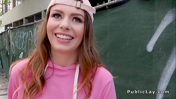 Nubile with cap gets facial cumshot in public